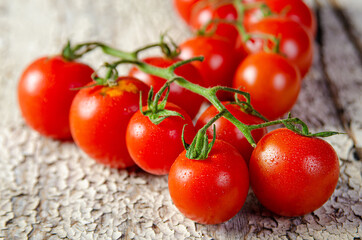 Tomato in a random arrangement on wood with rustic patina