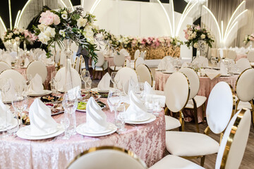 Bright festive hall with beautiful flowers and serving