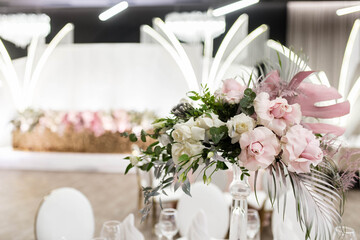 Bright festive hall with beautiful flowers and serving