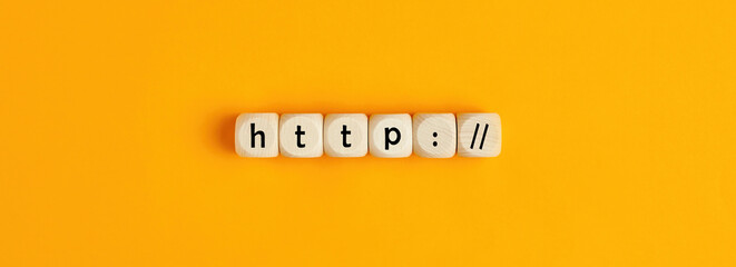 Word http on wooden blocks on yellow background.