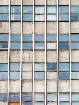 Detail With Very Old Office Building From Communist Era. Worn Out Office Building.