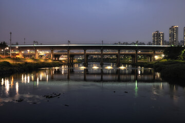 Jungnangcheon stream and subway bridge