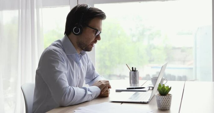 Boss lead distant negotiations or training from home due covid-19 quarantine. Employer talk with applicant telling about tasks of vacancy using headset pc and video call app, job interview concept