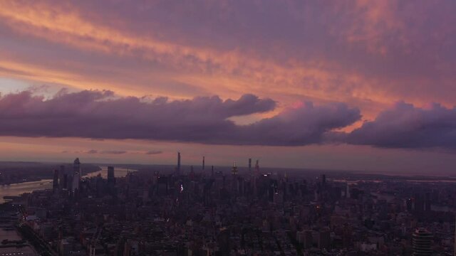 4K RAW Footage in D-log: New York City Skyline and its waterfront at sunset. Amazing view of Manhattan, NYC, USA
