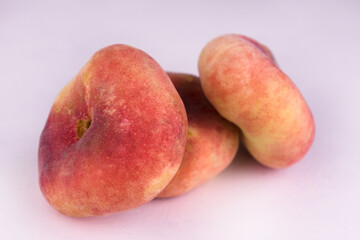 
Fig peaches on a white background.Close-up.