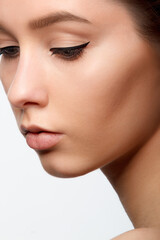 Fototapeta premium Beautiful Young Woman with Clean Fresh Skin . Cosmetology , beauty and spa .