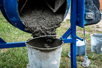 The preparation of the concrete mortar in concrete mixer.