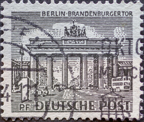 GERMANY, Berlin - CIRCA 1949: a postage stamp from Germany, Berlin showing Berlin buildings. The Brandenburg Gate in black