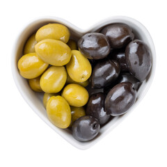 Green and black olives in heartshaped bowl isolated on white. Top view.