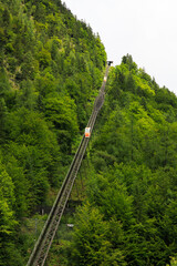 Fototapeta premium A cable car taking visitors up to Salzwelten; one of the oldest salt mines in the world. The salt mine is located in Hallstatt, Austria.