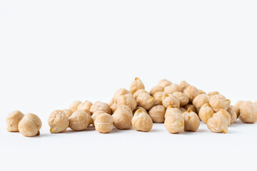 Pile of chickpeas on white background. Garbanzo beans traditional Near Easten food.