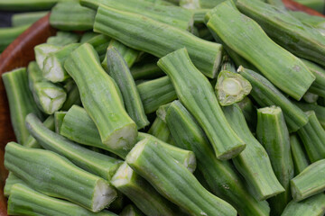Cut moringa drumstics, close up