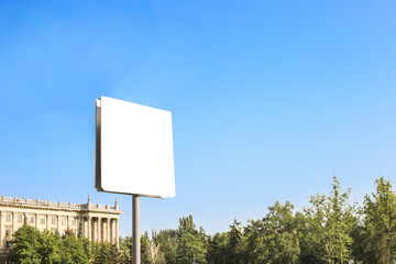 . Copy space for blank road sign on a historic city background. Summer. Mock up. Copy space for text