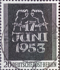 GERMANY, Berlin - CIRCA 1953: a postage stamp from Germany, Berlin showing bound hands break the...