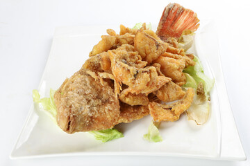 Deep fried freshwater red whole tilapia fish sliced fillet