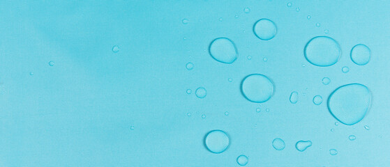 drops of water on the surface of the fabric. macro.