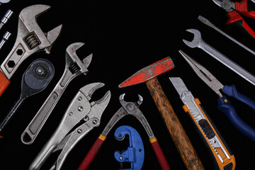 Industrial tools such as French wrenches and a variety of wrenches from a close-up in the form of...