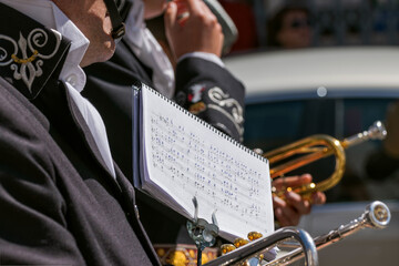 Band musicians marching in an Easter procession.