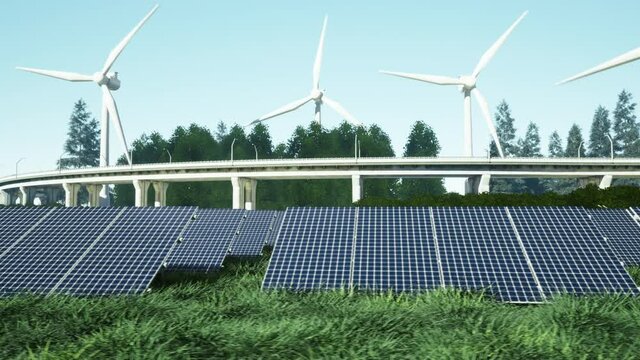 Field of solar panels with wind generators in the background