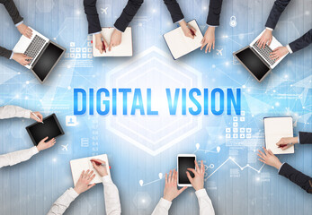 Group of Busy People Working in an Office with DIGITAL VISION inscription, modern technology concept
