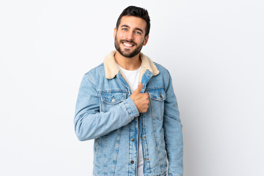 Young Handsome Man With Beard Isolated On White Background Giving A Thumbs Up Gesture