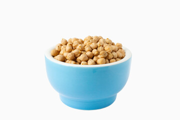 Chickpeas in a handmade ceramic bowl on grey background. Garbanzo beans traditional Near Easten food.