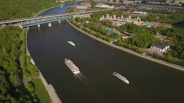 sunny day moscow luzhniki stadium sparrow hills traffic river aerial flight over panorama 4k russia