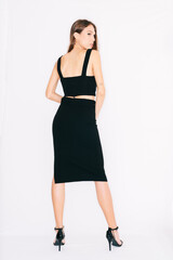 Fototapeta premium young woman in a dress, isolated on white.