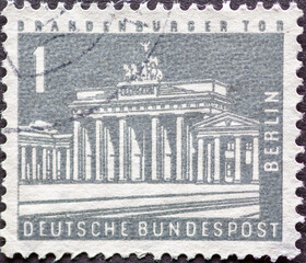 ERMANY, Berlin - CIRCA 1962: a postage stamp from Germany, Berlin showing Berlin cityscapes. Brandenburg Gate color: gray