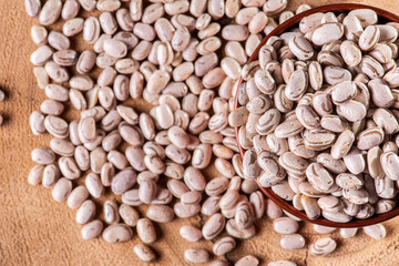 Fototapeta premium Raw brown bean grains seen close up