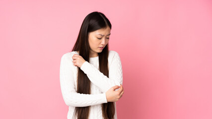 Fototapeta premium Young asian woman over isolated background with pain in elbow