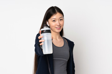 Young sport asian woman isolated on white background with sports water bottle