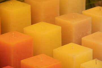 square candles of different colors