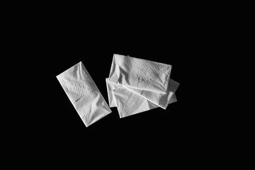 Paper handkerchiefs of a black background