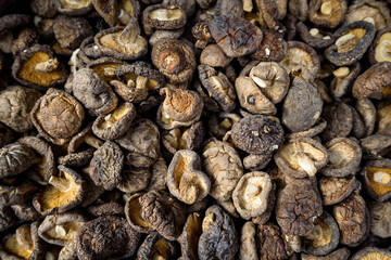 dried shiitake mushrooms background , Asian cuisine food ingredient