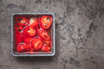 Red pickled chili in vinegar