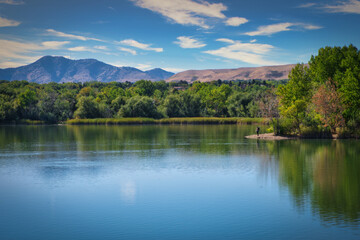 Fototapeta na wymiar lake in the mountains with blue sky