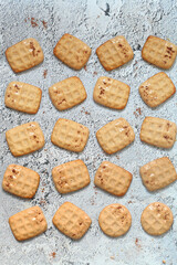 Cinnamon Wafer Cookies dipped in caramelized chocolate, on grey background.