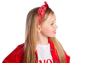 Portrait of a beautiful European blonde girl with long hair. Side view. Preschooler. Happy child. On white background.