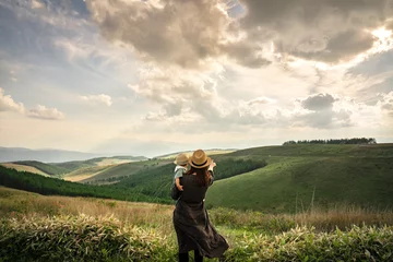 Fotobehang 壮大な景色を眺める母と子 © Kitamura Masaya