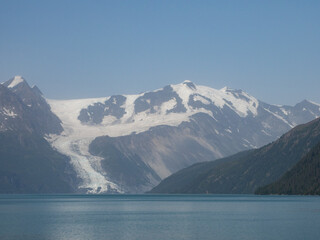 Fototapeta na wymiar Glacier and mountain range view from cruise ship. Prince William Sound, Alaska, USA.