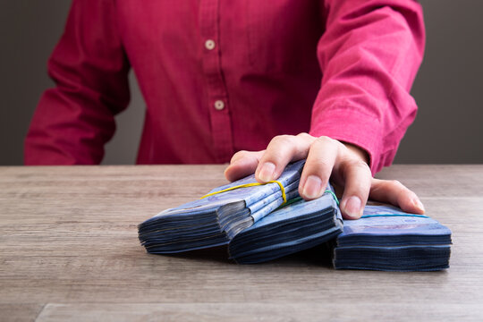 Businessman receive money - anti bribery and corruption concepts