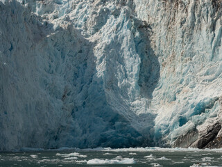Surprise Glacier and ices floating in the sea . Prince William Sound, Alaska, USA.