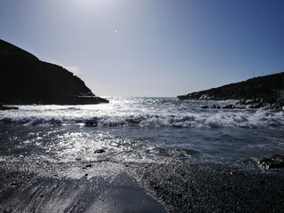 waves crashing on rocks