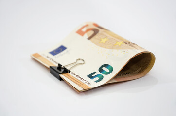 50 euro banknotes with a clip on a white background
