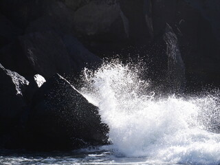 wave breaking on the rocks