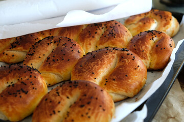 homemade cheese and sesame pastry, ing paper in the baking tray,