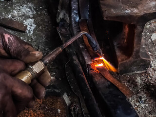 Fire sparkle generates due to welding work.