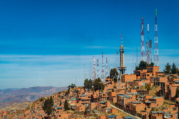 Fototapeta premium The City of La Paz, Bolivia Seen From The Sky With Mountains Peaks of The Andes Cordillera