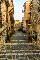 Fototapeta na wymiar A traditional street in Castelmola above Taormina, Sicily in summer